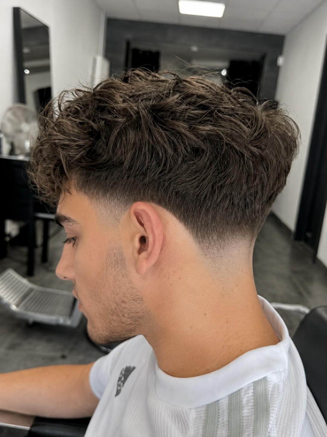 Mid taper fade haircut